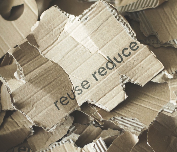 torn pices of cardboard reuse recycle