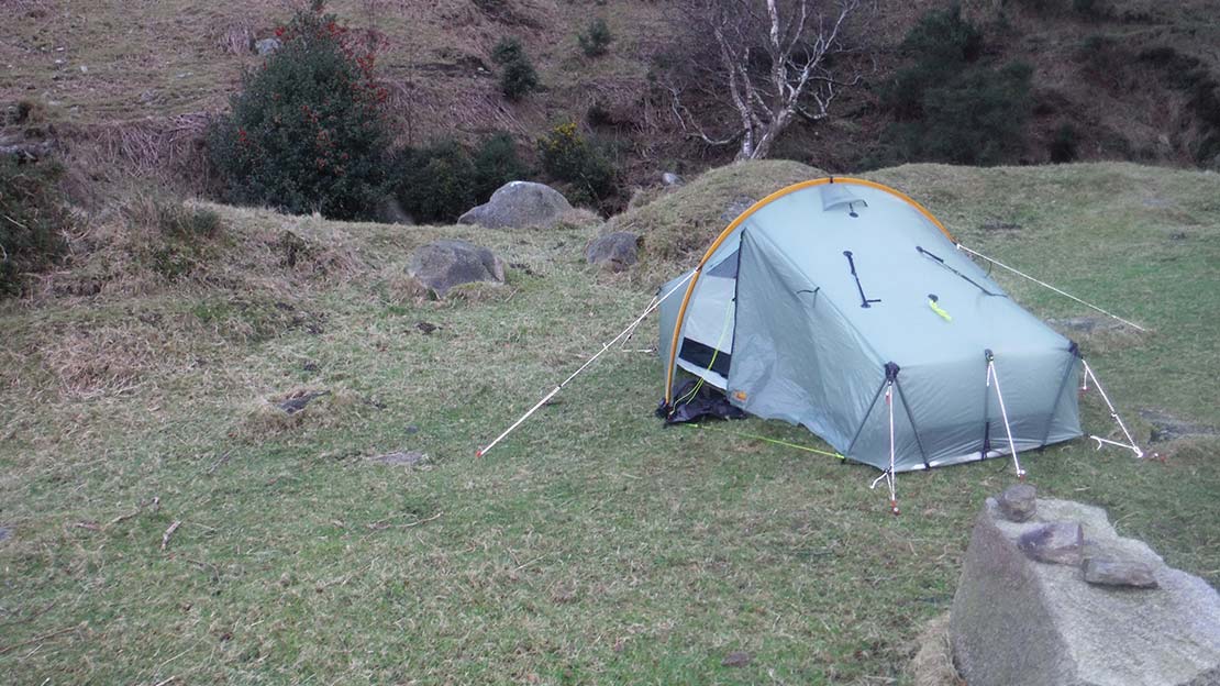 scarp tarp tent 2 pitched by a river - Leave no trace: The 7 Principles - Camping