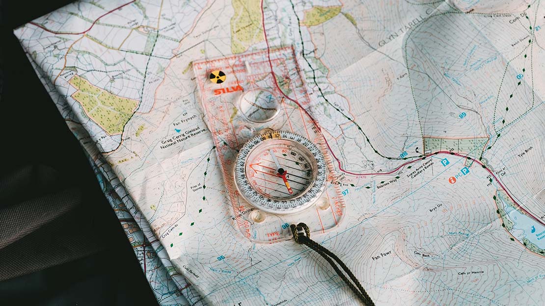 Silva compass on a paper map ,Mountain Ways Ireland - What's in my rucksack?