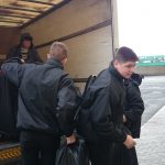 Pupils loading lorry