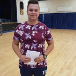 Dawid Szkopinski Year 11 celebrating the school's first ever A-Level Polish success along with his GCSE success