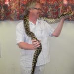Man holding a snake